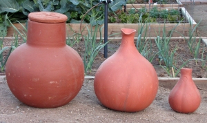  The olla on the left is from Dripping Springs Ollas out of Texas ( http://drippingspringsollas.com/ ) and the other two are from Growing Awareness Urban Farm, a micro-enterprise of East Central Ministries in Albuquerque, NM  (http://www.growingawarenessurbanfarm.com/ )
